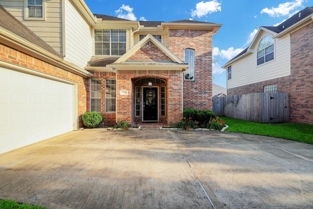 4714 Schiller Park Ln, Sugar Land, TX 77479 - entrance to property featuring brick siding, driveway, and an attached garage