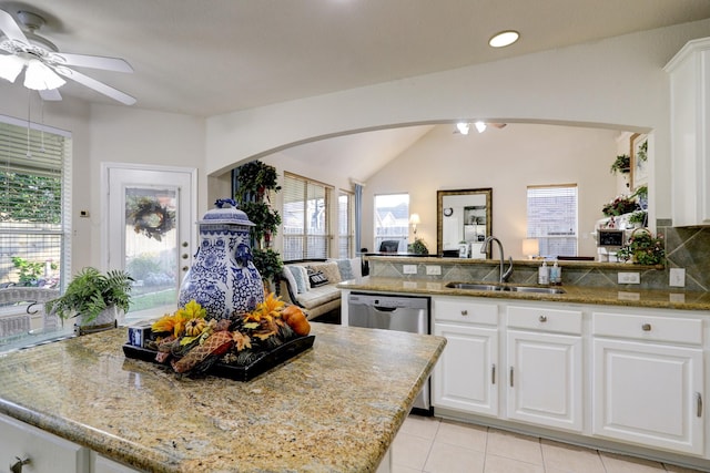 4714 Schiller Park Ln, Sugar Land, TX 77479 - kitchen featuring ceiling fan, dishwasher, white cabinetry, and vaulted ceiling