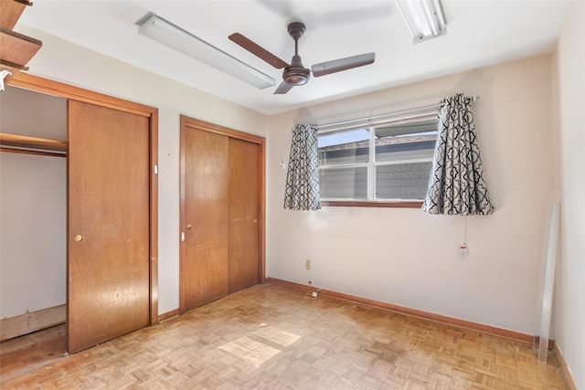 7202 Pinetex Dr, Houston, TX 77396 - unfurnished bedroom featuring two closets and ceiling fan