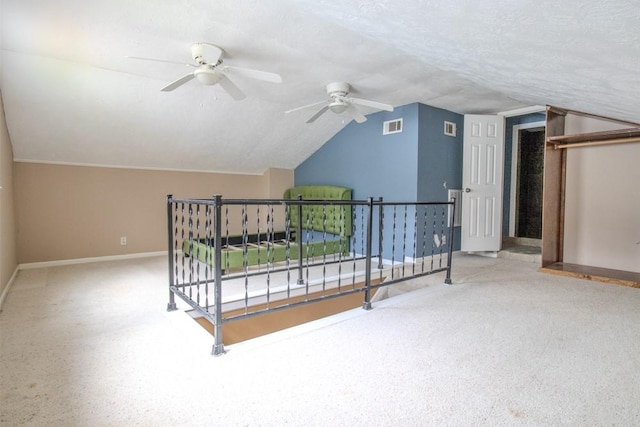 3834 Gamlin Bend Dr, Houston, TX 77082 - bonus room with vaulted ceiling, a ceiling fan, and a textured ceiling