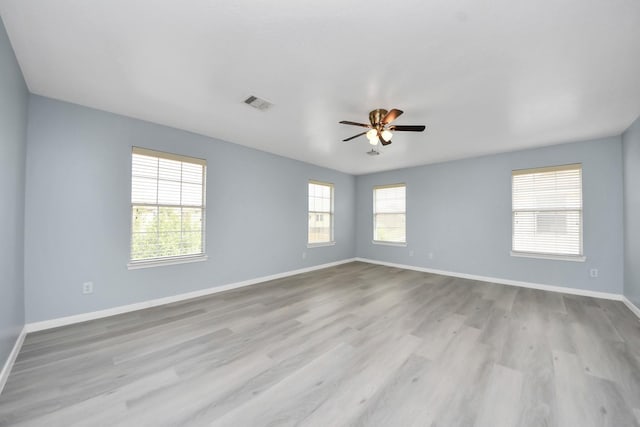 6803 Chapelfield Ln, Houston, TX 77049 - spare room featuring a ceiling fan, healthy amount of natural light, and wood finished floors