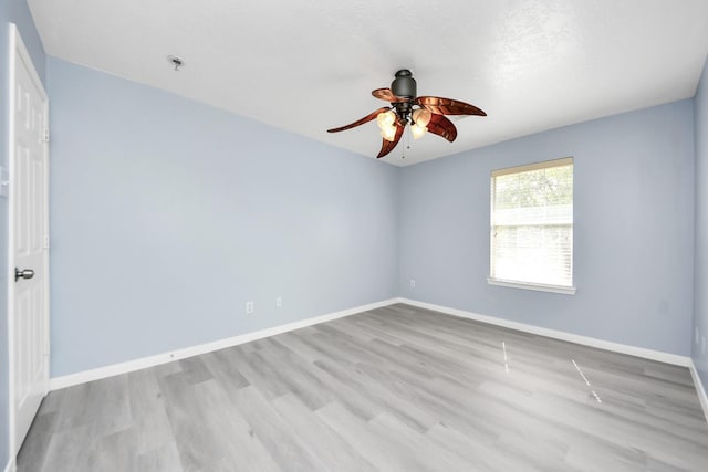 6803 Chapelfield Ln, Houston, TX 77049 - unfurnished room featuring ceiling fan, wood finished floors, and a pendent fire sprinkler