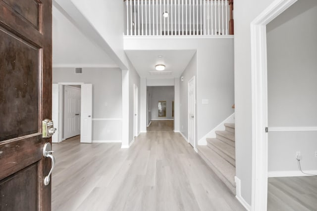 6803 Chapelfield Ln, Houston, TX 77049 - entrance foyer with light wood-style floors and stairway