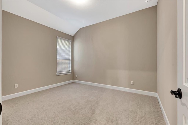 1939 Heather Canyon Dr, Pearland, TX 77089 - unfurnished room with light colored carpet and vaulted ceiling