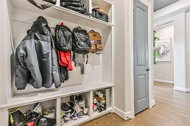 1939 Heather Canyon Dr, Pearland, TX 77089 - mudroom with baseboards and wood finished floors