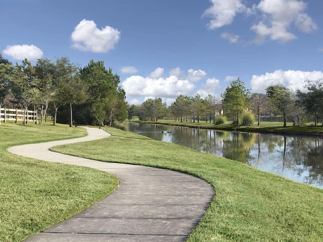 1939 Heather Canyon Dr, Pearland, TX 77089 - view of property's community with a water view and a yard