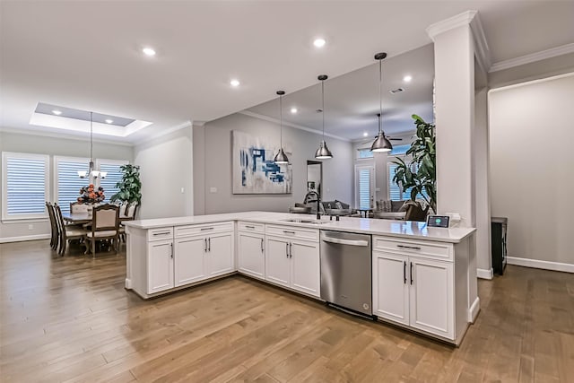 1939 Heather Canyon Dr, Pearland, TX 77089 - kitchen featuring stainless steel dishwasher, crown molding, light countertops, light wood-type flooring, and recessed lighting