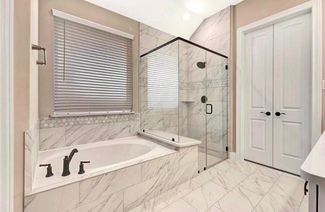 1939 Heather Canyon Dr, Pearland, TX 77089 - full bath with a garden tub, a marble finish shower, marble look tile flooring, and vaulted ceiling
