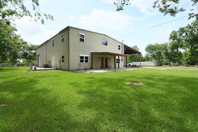 6709 Jay Rd, Hitchcock, TX 77563 - back of property with a patio area