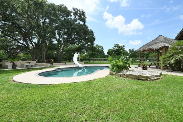 6709 Jay Rd, Hitchcock, TX 77563 - outdoor pool with a gazebo, a water slide, and a yard