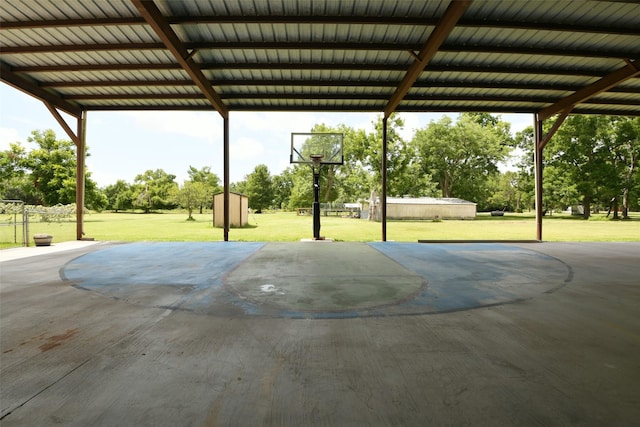 6709 Jay Rd, Hitchcock, TX 77563 - view of patio / terrace with view of wooded area and a storage unit