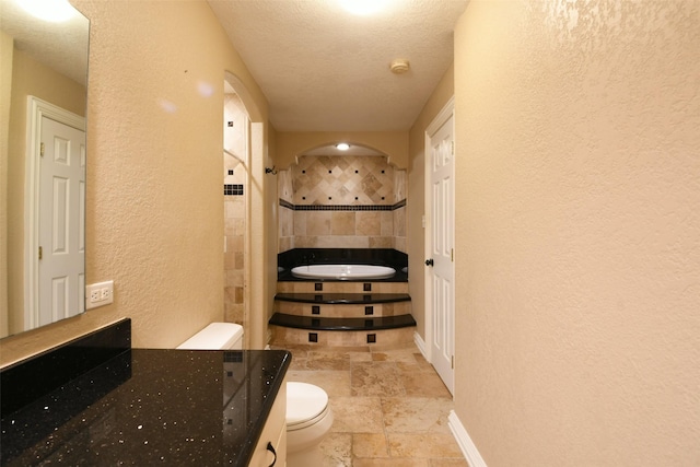 6709 Jay Rd, Hitchcock, TX 77563 - full bath with a textured wall, stone tile flooring, a bathtub, and a textured ceiling