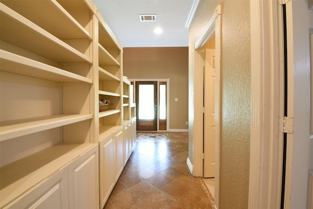 6709 Jay Rd, Hitchcock, TX 77563 - hallway featuring recessed lighting and light tile patterned floors