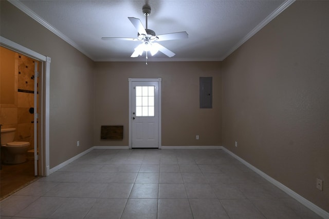 6709 Jay Rd, Hitchcock, TX 77563 - spare room featuring ceiling fan, electric panel, crown molding, and light tile patterned floors