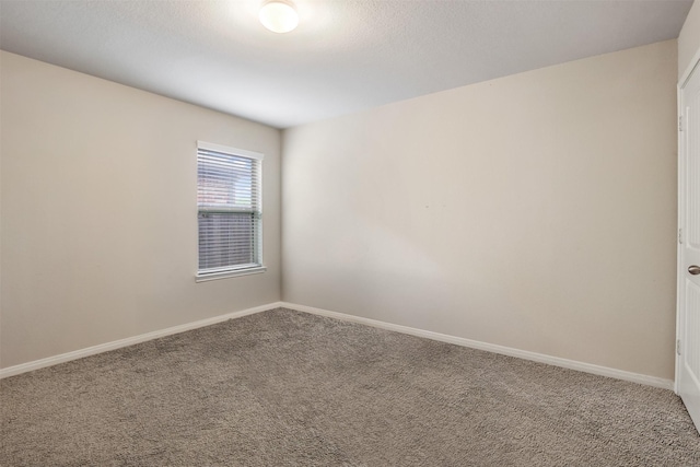 6914 Arcadia Meadow Ct, Richmond, TX 77407 - carpeted empty room featuring baseboards