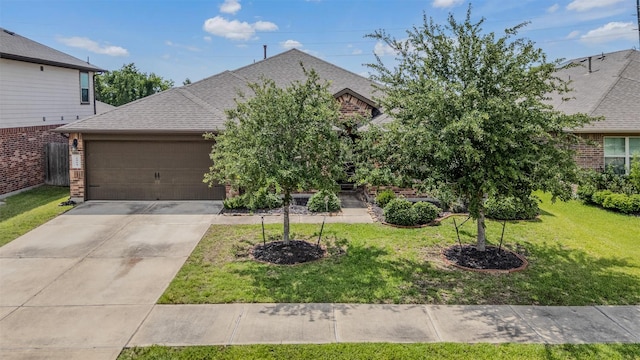 6914 Arcadia Meadow Ct, Richmond, TX 77407 - obstructed view of property featuring brick siding, a garage, roof with shingles, and driveway