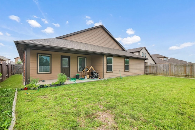 6914 Arcadia Meadow Ct, Richmond, TX 77407 - rear view of house featuring a patio area, a fenced backyard, and a shingled roof