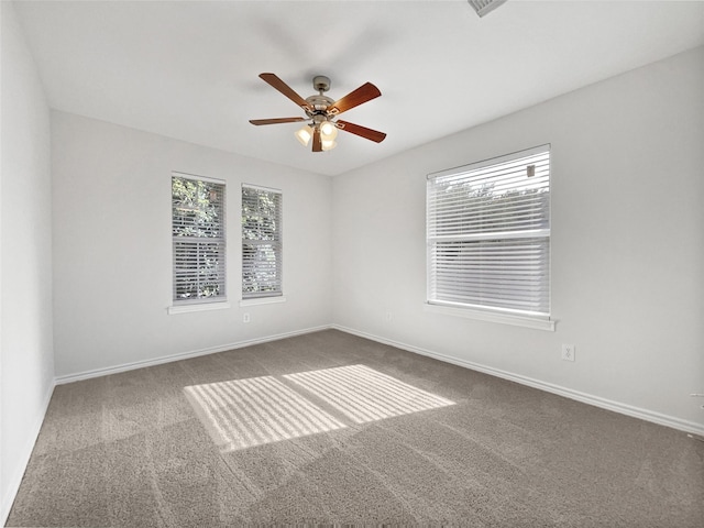 2317 Shady Pine Dr, Conroe, TX 77301 - spare room with carpet floors, plenty of natural light, and ceiling fan
