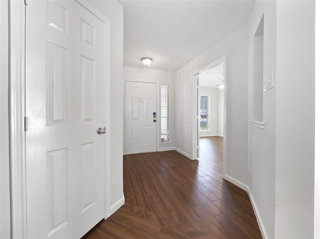 2317 Shady Pine Dr, Conroe, TX 77301 - entryway with dark wood finished floors and a ceiling fan