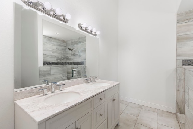 2464 N Walker Rd, Cleveland, TX 77328 - full bath featuring double vanity, tiled shower, and tile patterned flooring