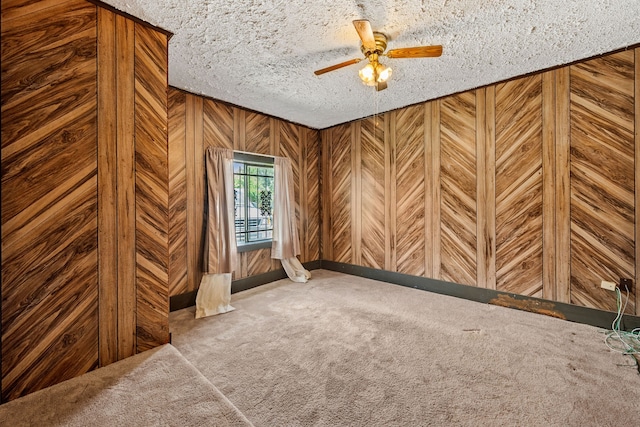 11302 Murr Way, Houston, TX 77048 - carpeted spare room with ceiling fan and wooden walls