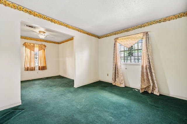 11302 Murr Way, Houston, TX 77048 - empty room with plenty of natural light, carpet, a textured ceiling, and ceiling fan