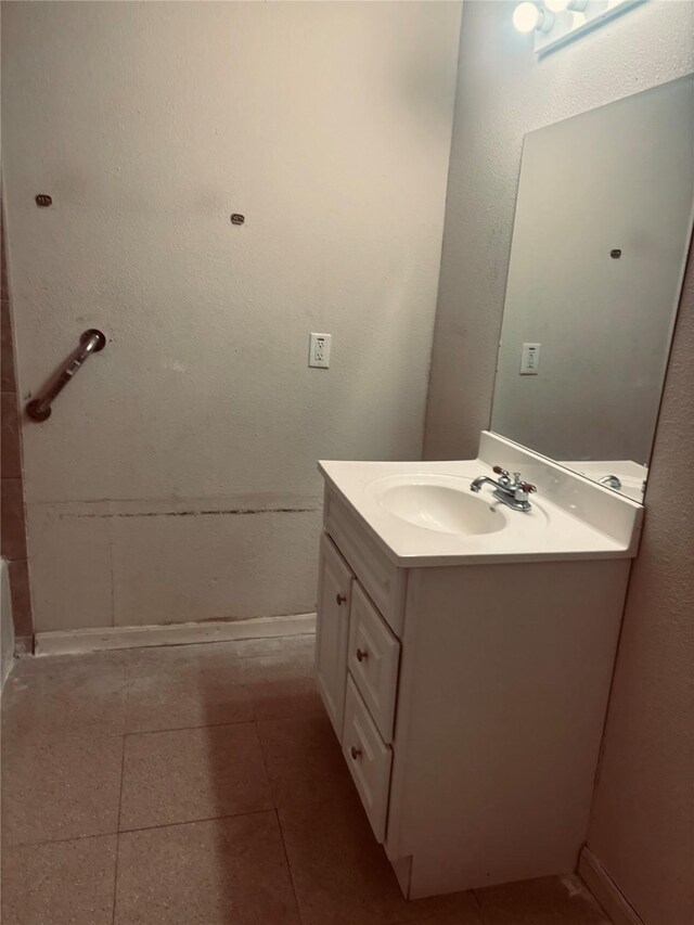 7350 Hurtgen Forest Rd, Houston, TX 77033 - bathroom featuring vanity and tile patterned flooring