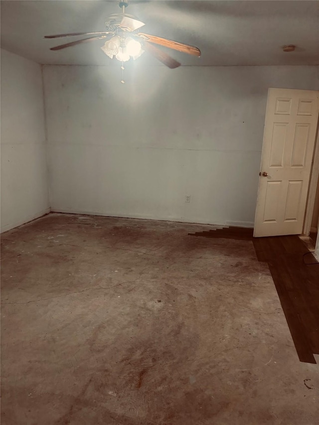 7350 Hurtgen Forest Rd, Houston, TX 77033 - spare room featuring a ceiling fan and unfinished concrete flooring