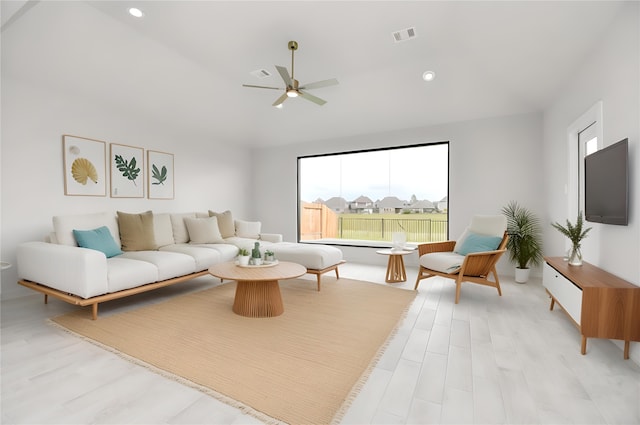 15819 Walnut Leaf Ln, Cypress, TX 77429 - living area featuring a ceiling fan, lofted ceiling, light wood-style floors, and recessed lighting
