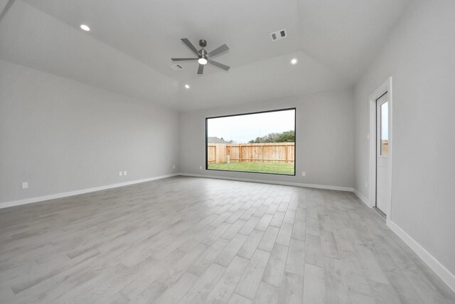 15819 Walnut Leaf Ln, Cypress, TX 77429 - spare room featuring healthy amount of natural light, ceiling fan, light wood finished floors, recessed lighting, and vaulted ceiling