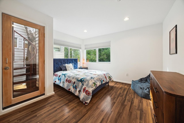 6532 Community Dr, West University Place, TX 77005 - bedroom with dark wood finished floors and recessed lighting