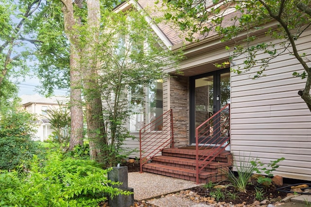 6532 Community Dr, West University Place, TX 77005 - property entrance featuring french doors and stone siding
