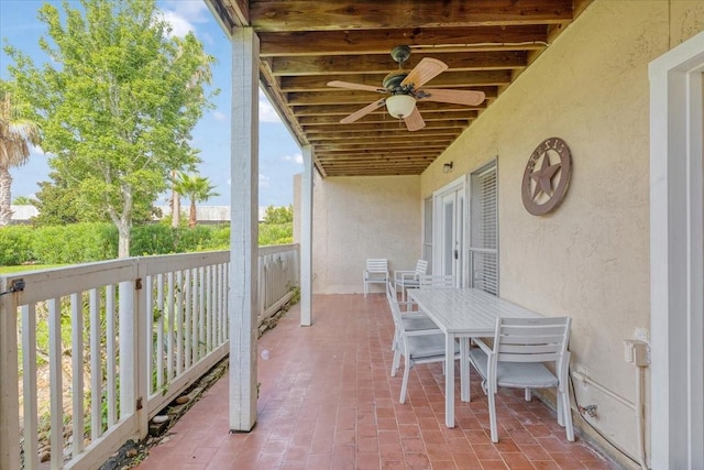 4747 Nasa Pkwy Unit 110, Seabrook, TX 77586 - view of patio / terrace featuring outdoor dining area and a ceiling fan