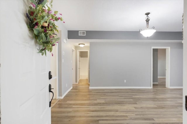 4747 Nasa Pkwy Unit 110, Seabrook, TX 77586 - foyer entrance with light wood finished floors and baseboards