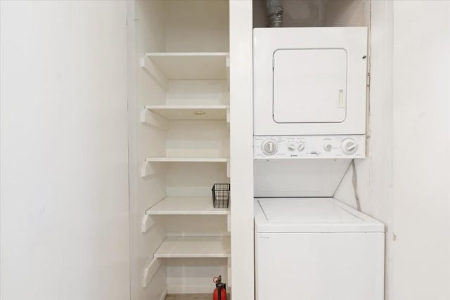 4747 Nasa Pkwy Unit 110, Seabrook, TX 77586 - washroom with stacked washer and clothes dryer