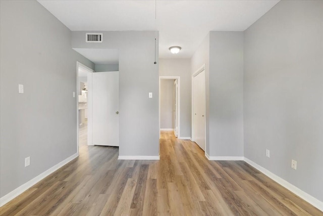 4747 Nasa Pkwy Unit 110, Seabrook, TX 77586 - unfurnished room with light wood-style floors