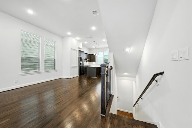 4106 Schuler St, Houston, TX 77007 - living room featuring dark wood-style flooring and recessed lighting