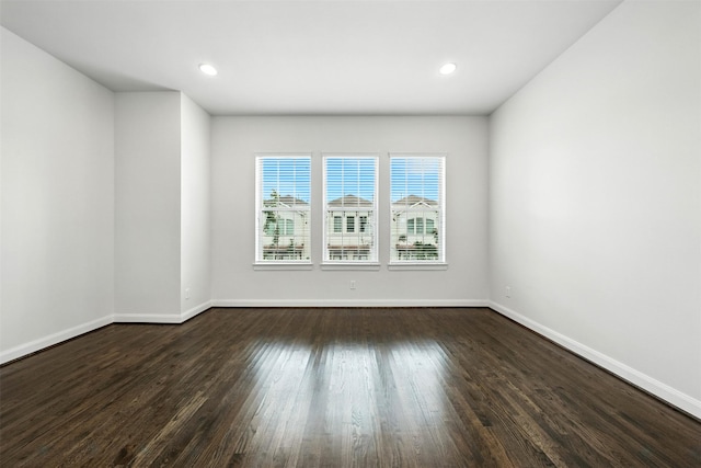 4106 Schuler St, Houston, TX 77007 - spare room featuring dark wood-type flooring and recessed lighting