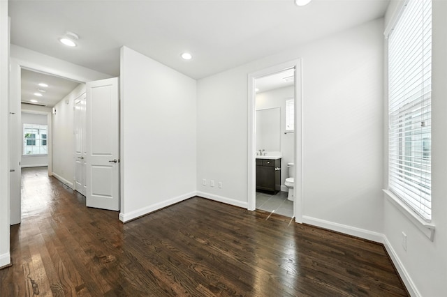 4106 Schuler St, Houston, TX 77007 - empty room featuring dark wood-style flooring and recessed lighting