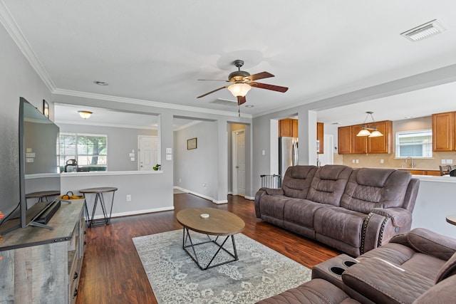 29406 Legends Stone Dr, Spring, TX 77386 - living room with a ceiling fan, dark wood-style flooring, and crown molding