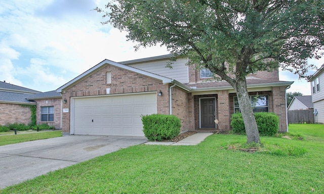 29406 Legends Stone Dr, Spring, TX 77386 - traditional-style home featuring a garage, driveway, and brick siding