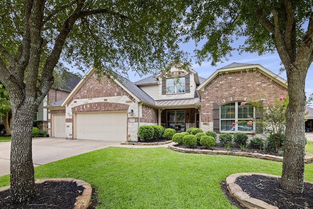 14107 Park Antique Ln, Cypress, TX 77429 - craftsman-style house featuring brick siding, concrete driveway, a garage, a front yard, and a standing seam roof