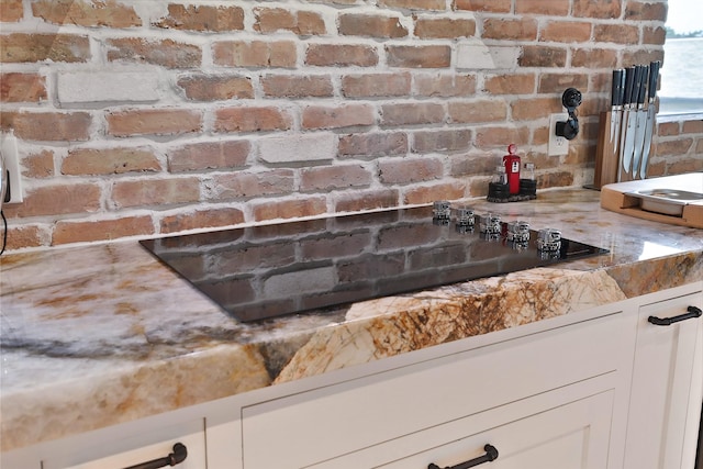 1435 Fm 1463rd Rd Unit C14, Katy, TX 77494 - detailed view of white cabinets and black electric stovetop
