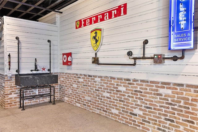 1435 Fm 1463rd Rd Unit C14, Katy, TX 77494 - miscellaneous room with brick wall and wood walls