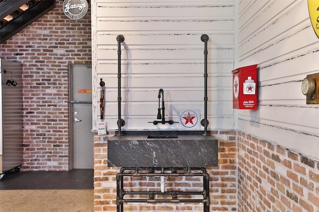 1435 Fm 1463rd Rd Unit C14, Katy, TX 77494 - miscellaneous room with brick wall