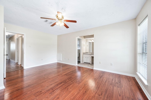 510 Shenandoah Dr, Shenandoah, TX 77381 - unfurnished room with ceiling fan, plenty of natural light, and wood finished floors