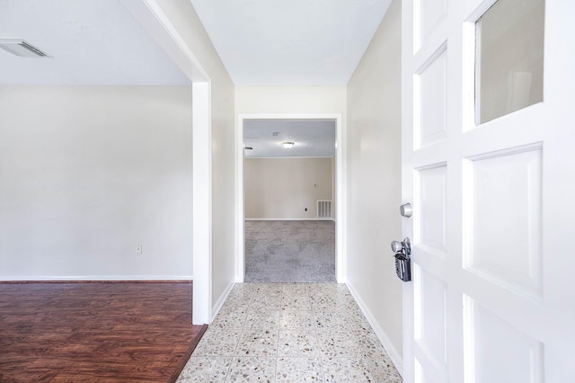 510 Shenandoah Dr, Shenandoah, TX 77381 - corridor featuring baseboards and tile patterned floors