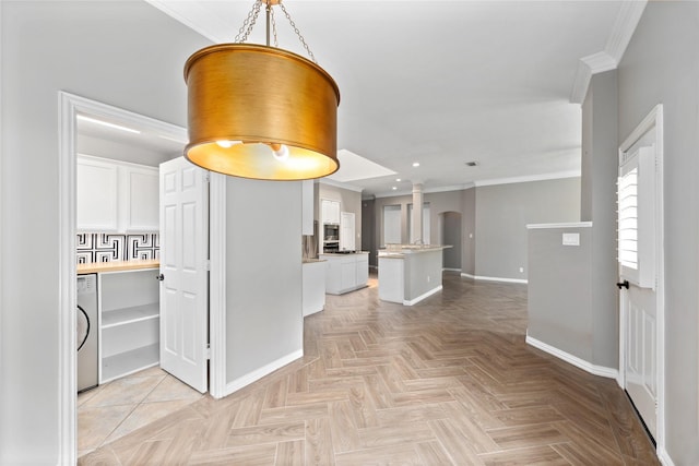 13718 Sherburn Manor Dr, Cypress, TX 77429 - hall featuring crown molding, arched walkways, recessed lighting, and washer / clothes dryer