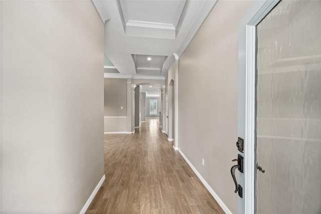 13718 Sherburn Manor Dr, Cypress, TX 77429 - hallway featuring ornate columns, crown molding, wood finished floors, and arched walkways