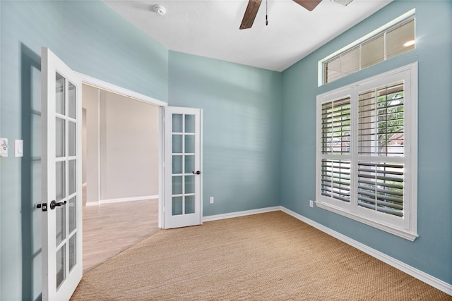 13718 Sherburn Manor Dr, Cypress, TX 77429 - spare room with french doors, ceiling fan, and carpet floors